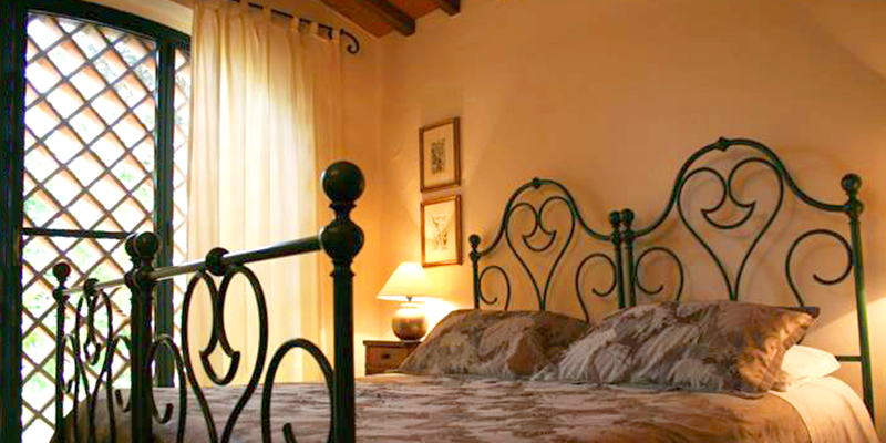 Cozy bedrooms at La Capanna