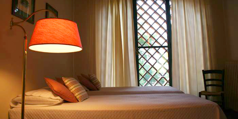 Timeless comfort, bedrooms at La Capanna