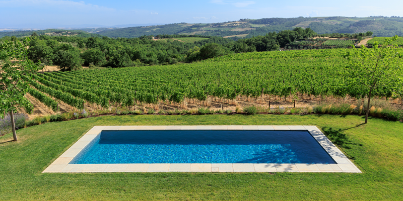 Enjoy a swim next to award-winning vineyards at Villa San Marcellino